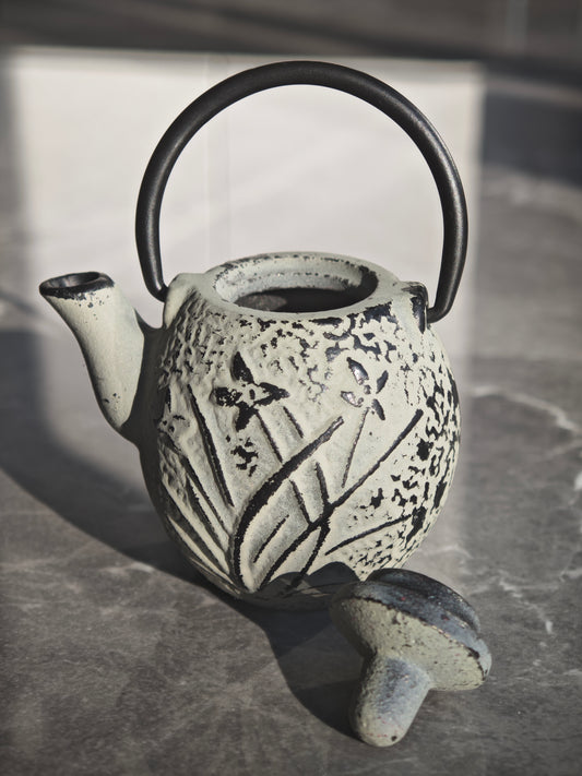 Elegant Charm of the Copper Kettle, with Plum Blossoms and Orchids in Harmony